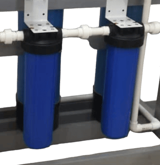 Foto-Com-Cort 2 Carcasas BIG-BLUE 20 Instaladas en Equipo Industrial No1